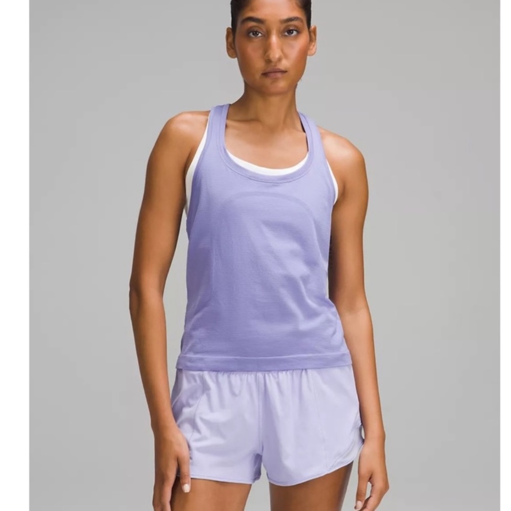 Lululemon Swiftly Tech Racerback Tank Top size 4 fading on the logo